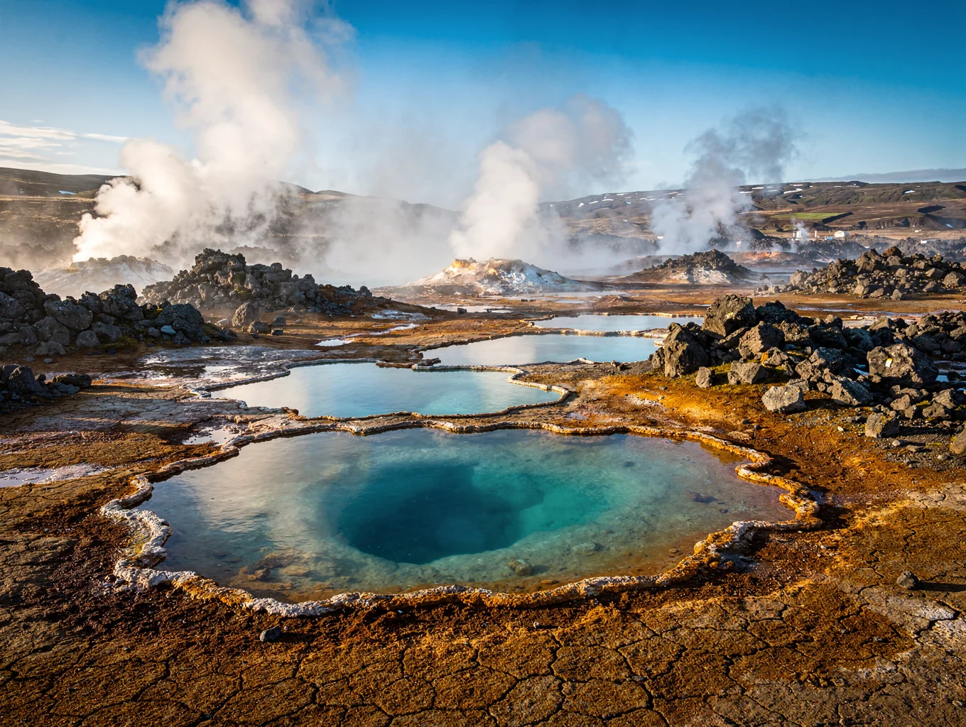 Colorful mineral deposits and steam vents in Iceland
